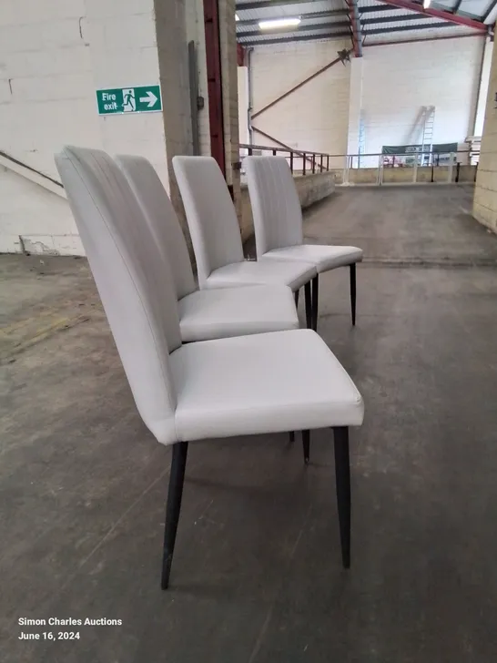 A QUALITY SET OF 4 FAUX LEATHER UPHOLSTERED CUSHIONED BACK DINING CHAIRS IN GREY