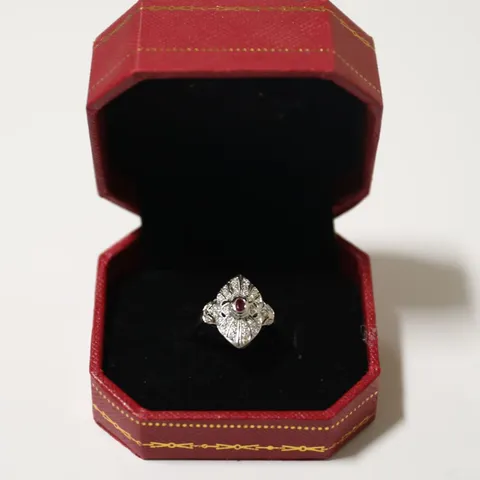 18CT WHITE GOLD RUBY AND DIAMOND DRESS RING