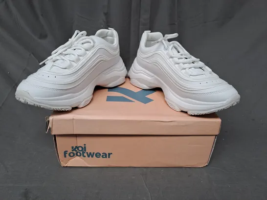 BOXED PAIR OF KOI EXTRA CHUNKY TRAINERS IN WHITE SIZE 7