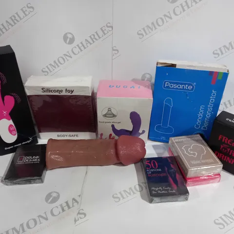 APPROXIMATELY 15 ASSORTED ADULT ITEMS T INCLUDE ADULT CARD GAMES, CONDOM DEMONSTRATOR, VIBRATOR, ETC