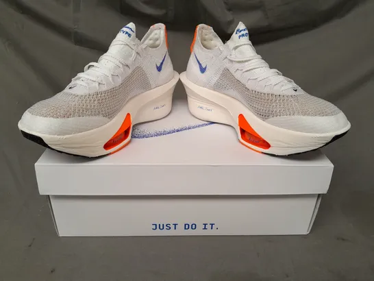 BOXED PAIR OF NIKE AIR ZOOM ALPHAFLY KNIT SHOES IN WHITE/BLUE/ORANGE UK SIZE 7.5