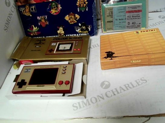 LOT OF APPROX 4 ASSORTED ITEMS TO INCLUDE: 7 WWF BADGES, GAME & WATCH BALL NINENDO  COLOUR SCREEN