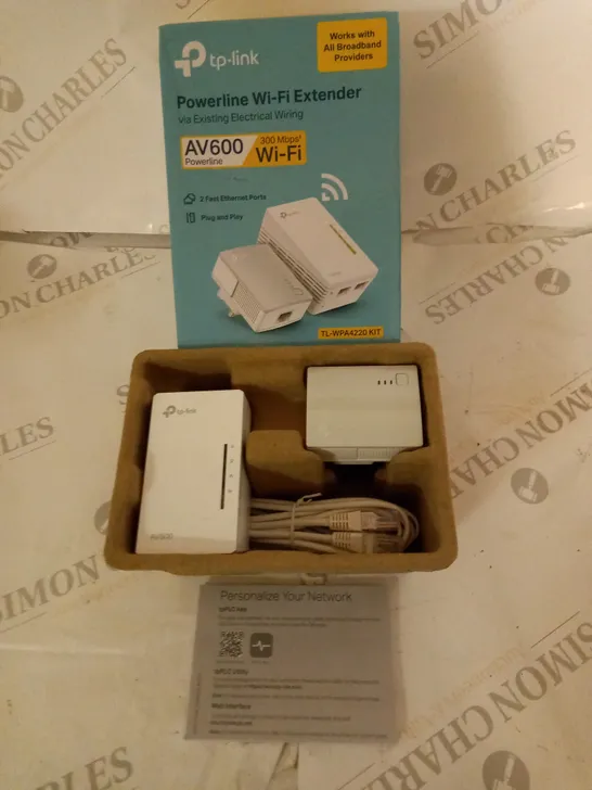 BOXED TP-LINK POWERLINE WIFI EXTENDER WITH ACCESSORIES AND MANUAL