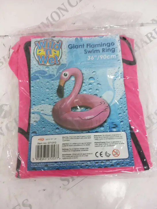 APPROXIMATELY EIGHT WILD N WET GIANT FLAMINGO SWIM RINGS