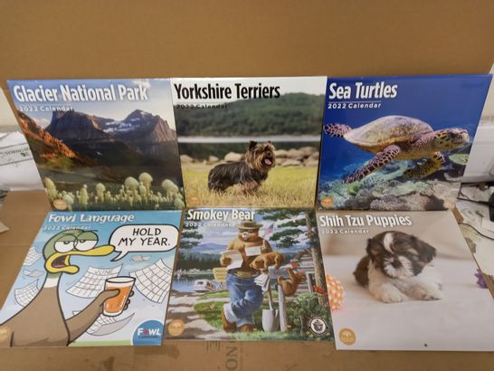 LOT OF 10 ASSORTED 2022 CALENDARS TO INCLUDE SEA TURTLES, FOWL LANGUAGE AND SHIH TZU PUPPIES