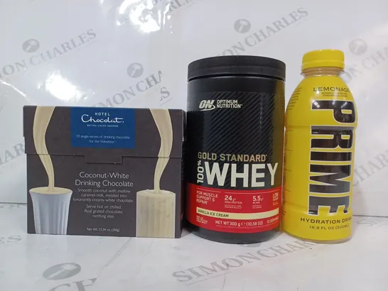 APPROXIMATELY 5 ASSORTED FOOD & DRINK ITEMS TO INCLUDE PRIME 500ML BOTTLE IN LEMONADE FLAVOUR, OPTIMUM NUTRITION GOLD STANDARD WHEY IN VANILLA ICE CREAM FLAVOUR, HOTEL CHOCOLAT COCONUT-WHITE DRINKING 