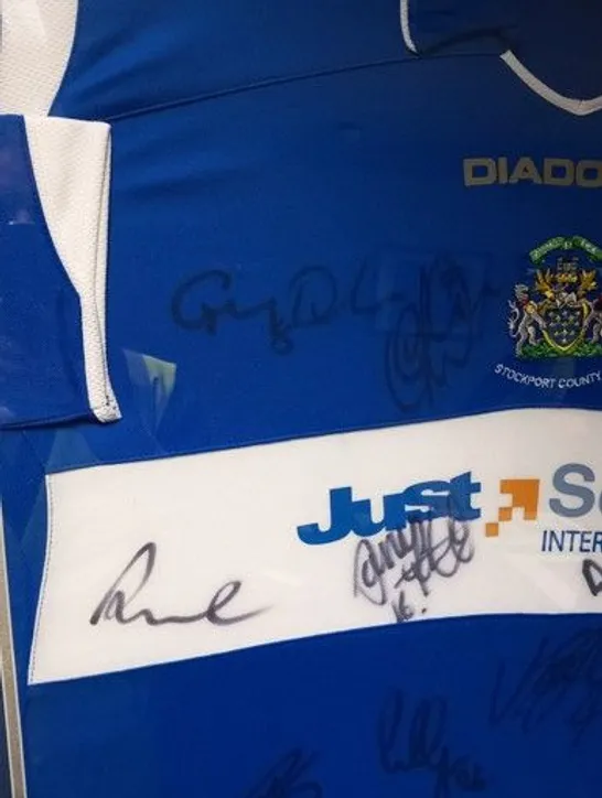 FRAMED, MOUNTED AND SIGNED STOCKPORT COUNTY FC HOME JERSEY