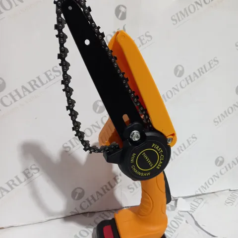 BOXED MINI CHAINSAW WITH BATTERIES AND GLOVES