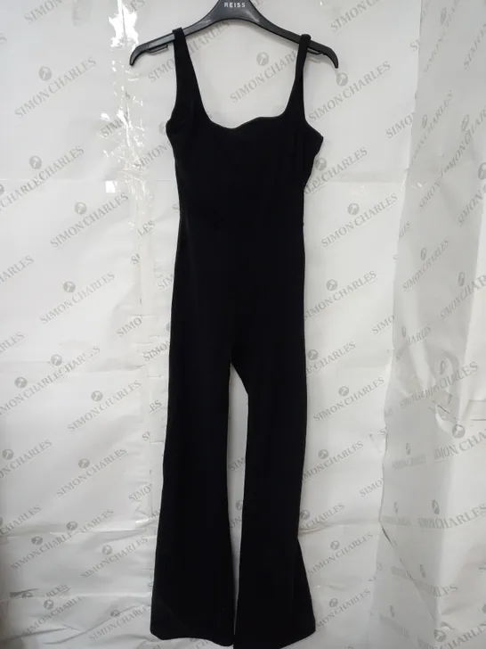 TALLA BUILT IN SPORTS BRA FLARE LEG JUMPSUIT IN BLACK SIZE S