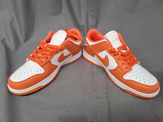 BOXED PAIR OF NIKE SHOES IN ORANGE/WHITE UK SIZE 6.5