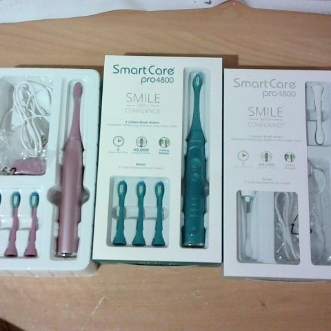 LOT OF 3 ASSORTED SMART CARE PRO4800 ELECTRIC TOOTHBRUSHES