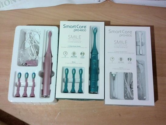 LOT OF 3 ASSORTED SMART CARE PRO4800 ELECTRIC TOOTHBRUSHES