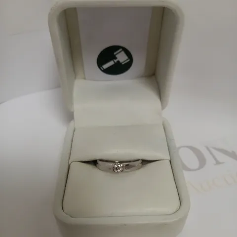 DESIGNER 18CT WHITE GOLD RING TENSION-SET WITH A DIAMOND
