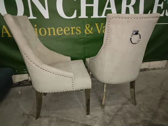 PAIR OF BEIGE FABRIC UPHOLSTERED DINING CHAIRS ON CHROME LEGS WITH STUD DETAILS