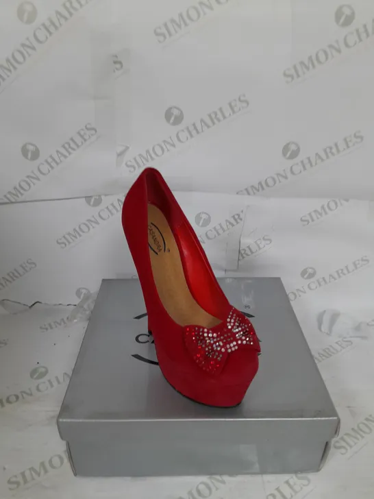 BOXED PAIR OF CASANDRA PLATFORM STILETTO HEEL IN RED SUEDE WITH RHINESTONE BOW DETAIL SIZE 4