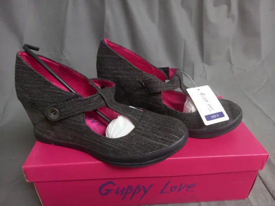 BOX OF APPROXIMATELY 10 BLACK  GUPPY LOVE BY BLOWFISH SHOES IN VARIOUS SIZES 