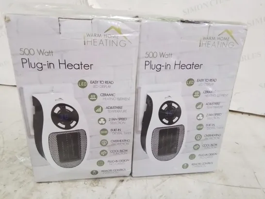 TWO BOXED 500 WATT PLUG IN HEATERS 