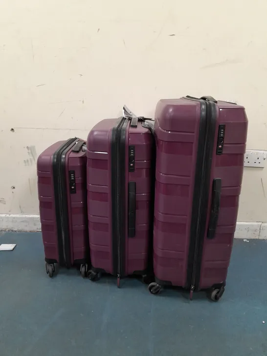 HEYS SET OF 3 ASSORTED SIZE SUITCASES IN PURPLE