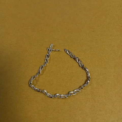 WHITE GOLD 20 POINT DIAMOND INFINITY BRACELET 