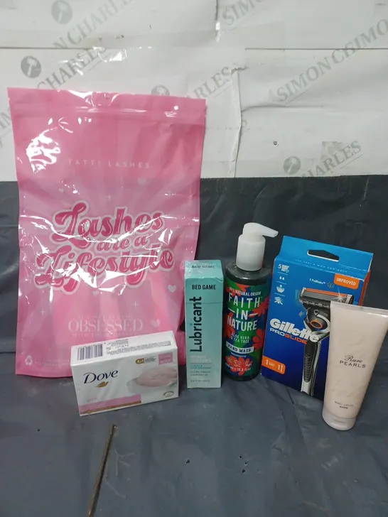 APPROXIMATELY 20 ASSORTED COSMETIC PRODUCTS TO INCLUDE TATTI LASHES, DOVE SOAP, AND GILLETTE PROGLIDE RAZOR  ETC. 