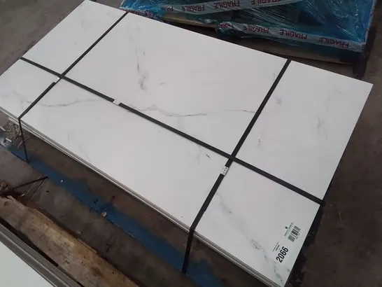 PALLET CONTAINING 16 WHITE MARBLE EFFECT PORCELAIN TILES EACH 1200 × 600