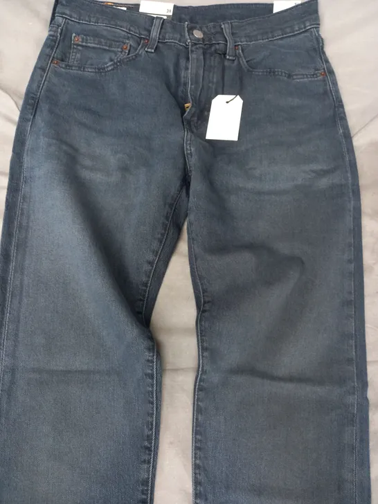 LEVI'S CLIM TAPER JEANS IN DARK BLUE SIZE 31/34