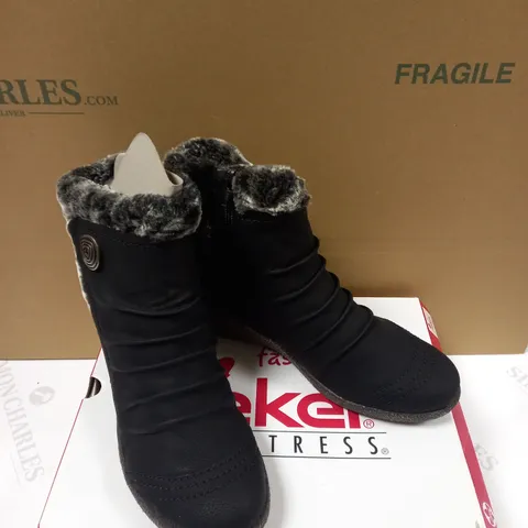 BOXED PAIR OF RIEKER BLACK WEDGE ANKLE BOOTS WITH FAUX FUR TRIM - SIZE 6