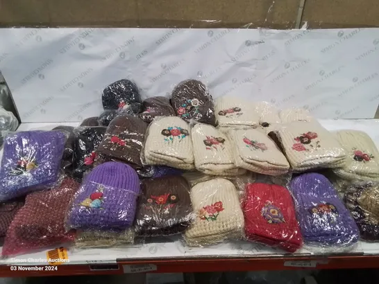 LOT CONTAINING LARGE AMOUNT OF BAGGED WOOLEN HATS IN VARIOUS COLOURS AND DESIGNS 