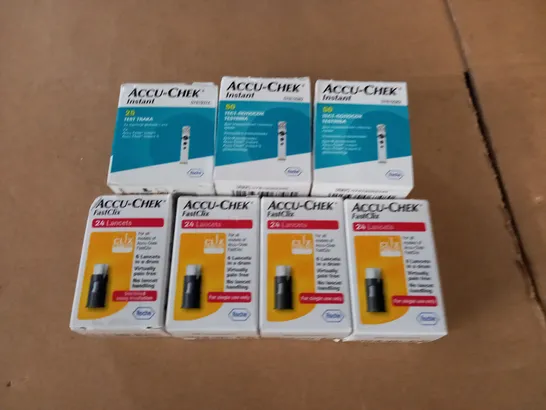 LOT OF 7 BOXES OF ACCU-CHEK ACCESSORIES