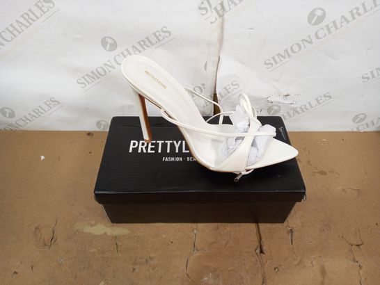 BOXED PAIR OF PRETTY LITTLE THING WHITE HIGH HEEL SANDALS SIZE 6