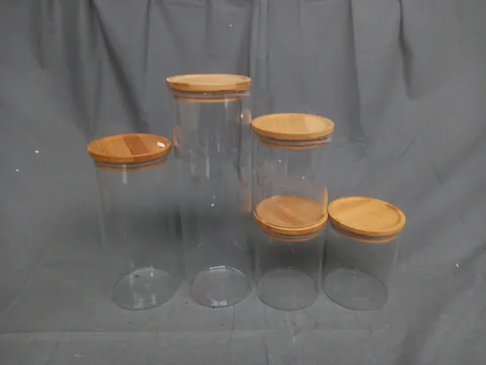 BOX OF 5 GLASS CAINSTERS IN VARIOUS SIZES