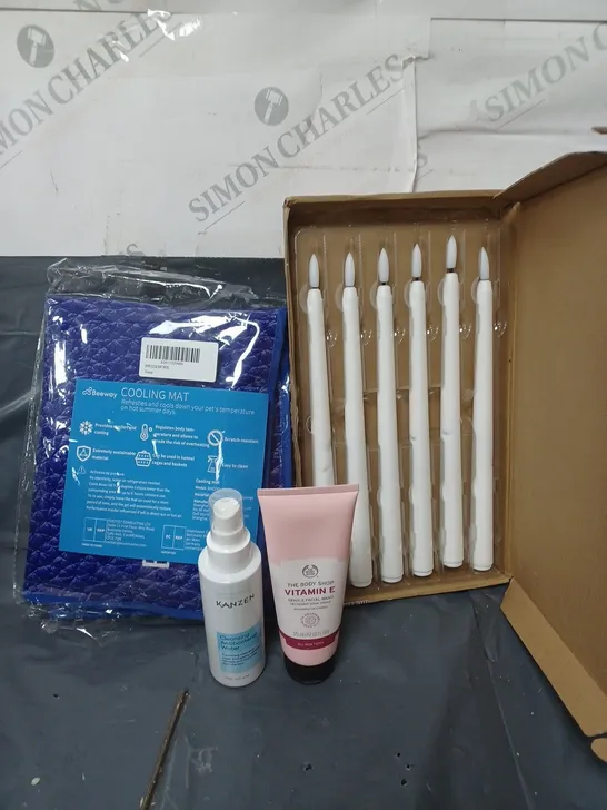 BOX OF APPROXIMATELY 20 ASSORTED HOUSEHOLD ITEMS TO INCLUDE LED CANDLES, COOLING MAT AND SKINCARE