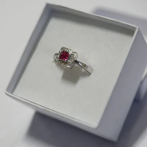 18CT WHITE GOLD DIAMOND AND GARNET DRESS RING