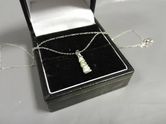 14CT WHITE GOLD PENDANT ON A CHAIN SET WITH NATURAL DIAMONDS