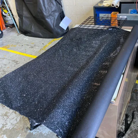 ROLL OF BLACK GLITTERY FABRIC