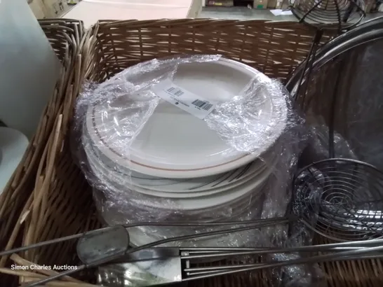 TWO WICKER BREAD BASKETS CONTAINING ASSORTED CATERING ITEMS, INCLUDING PLATTERS, TRAYS, CROCKERY, WIRE STRAINERS.