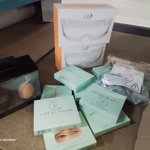 BOX OF ASSORTED MAKE UP ITEMS, INCLUDING, LIQUID FOUNDATION, EYELID CORRECTING STRIPS, 2 × ANTI AGING EYE MASKS