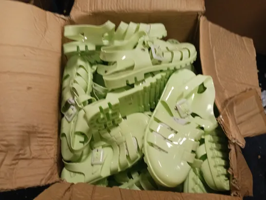 LOT OF APPROXIMATELY 12 PAIRS OF LINZI GREEN PLASTIC SANDALS - VARIOUS SIZES