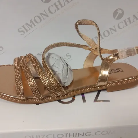 BOXED QUIZ ROSE SHIMMER DIA ASYM FLAT SANDALS SIZE 8