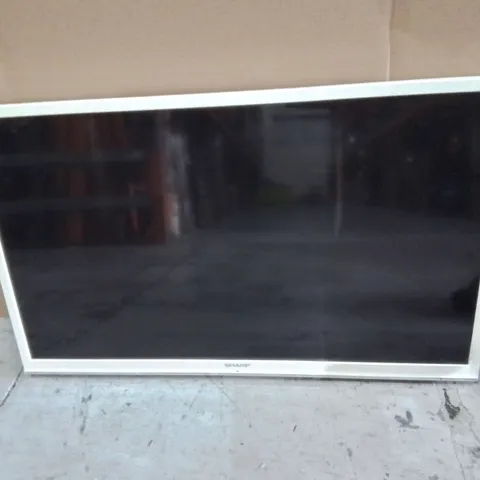 UNBOXED SHARP LCD COLOUR TV - LC-39LE351K-WH