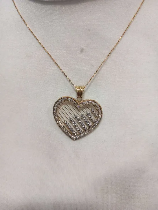 18CT GOLD HEART SHAPED PENDANT ON CHAIN, SET WITH NATURAL DIAMONDS