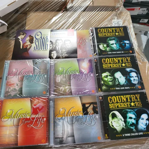 PALLET OF APPROXIMATELY 200 BRAND NEW ASSORTED COUNTRY SUPERSTARS AND MUSIC OF YOUR LIFE MUSIC CD SETS
