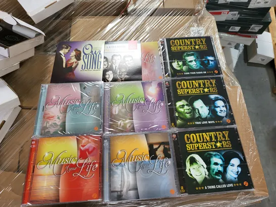 PALLET OF APPROXIMATELY 200 BRAND NEW ASSORTED COUNTRY SUPERSTARS AND MUSIC OF YOUR LIFE MUSIC CD SETS