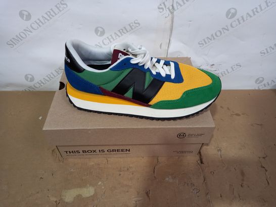 BOXED PAIR OF NEW BALANCE MULTICOLOURED TRAINERS SIZE 9