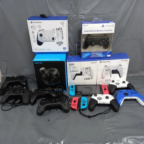 14 ASSORTED GAMING CONTROLLERS TO INCLUDE PLAYSTATION, XBOX AND NINTENDO