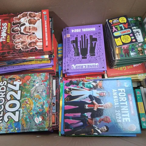 LARGE QUANTITY OF ASSORTED BOOKS AND 2024 ANNUALS TO INCLUDE GUINESS RECORDS 2024,  MINECRAFT, FORTNIGHT AND STRANGER THINGS