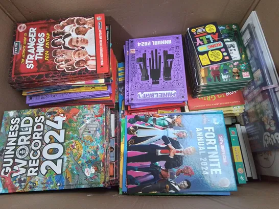 LARGE QUANTITY OF ASSORTED BOOKS AND 2024 ANNUALS TO INCLUDE GUINESS RECORDS 2024,  MINECRAFT, FORTNIGHT AND STRANGER THINGS