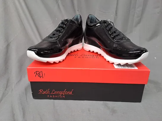 BOXED PAIR OF RUTH LANGSFORD WEDGE TRAINERS IN BLACK SIZE 4