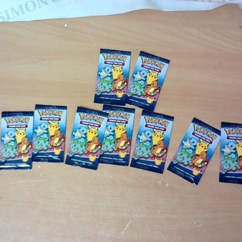LOT OF APPROXIMATELY 9 PACKS OF POKEMON CARDS