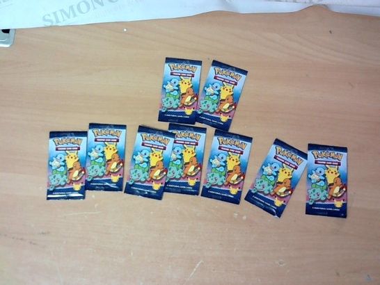 LOT OF APPROXIMATELY 9 PACKS OF POKEMON CARDS